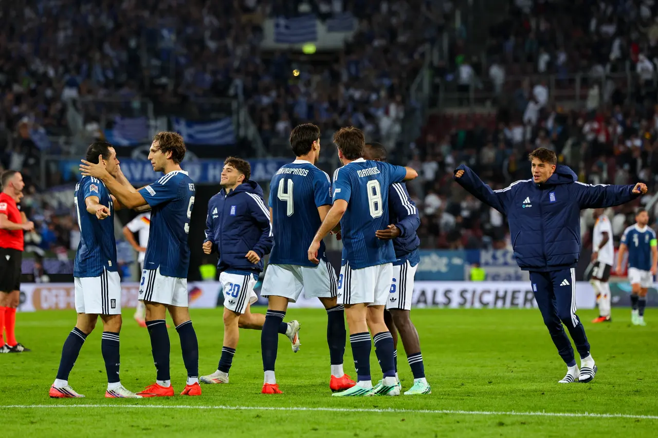 Players of Greece celebrate after winning the UEFA Nations League match Germany against Greece