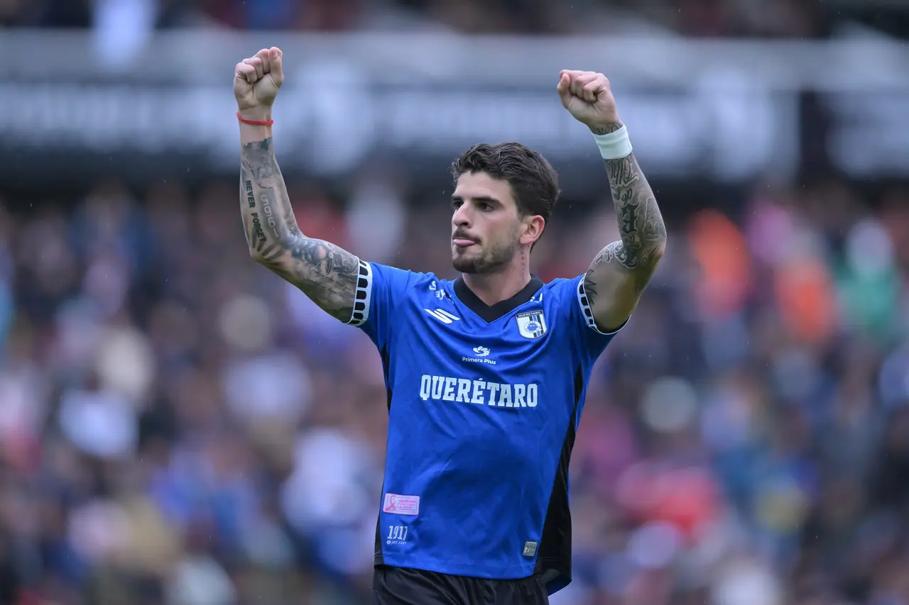 Santiago Homenchenko celebrates his goal 1-0 of Queretaro during the 11th round match between Queretaro vs (and) Atlante as part of the Liga