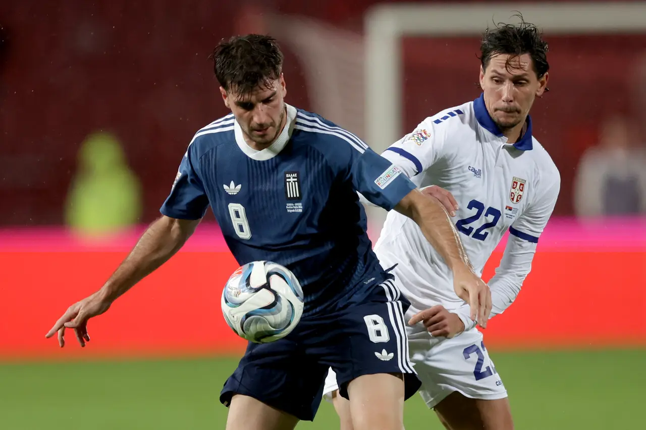 Fotis Ioannidis (L) of Greece and Sasa Lukic (R) of Serbia in action during the UEFA Nations League