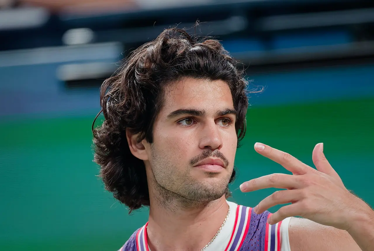 Carlos Alcaraz of Spain reacts during his men's singles match against Zizou Bergs of Belgium at the Shanghai Masters tennis tournament in Shanghai