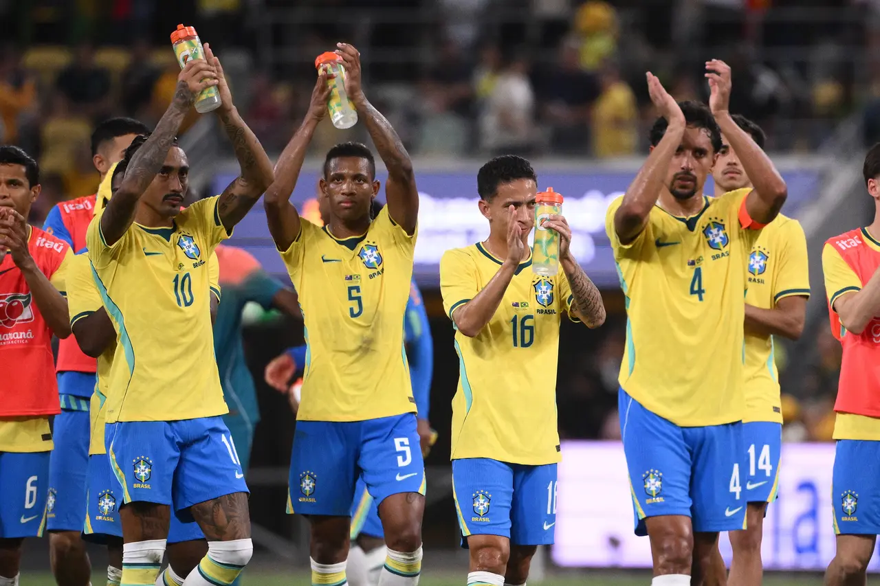 Raphinha (L) of Brazil and teammates acknowledge fans after the Queensland Football Series international friendly