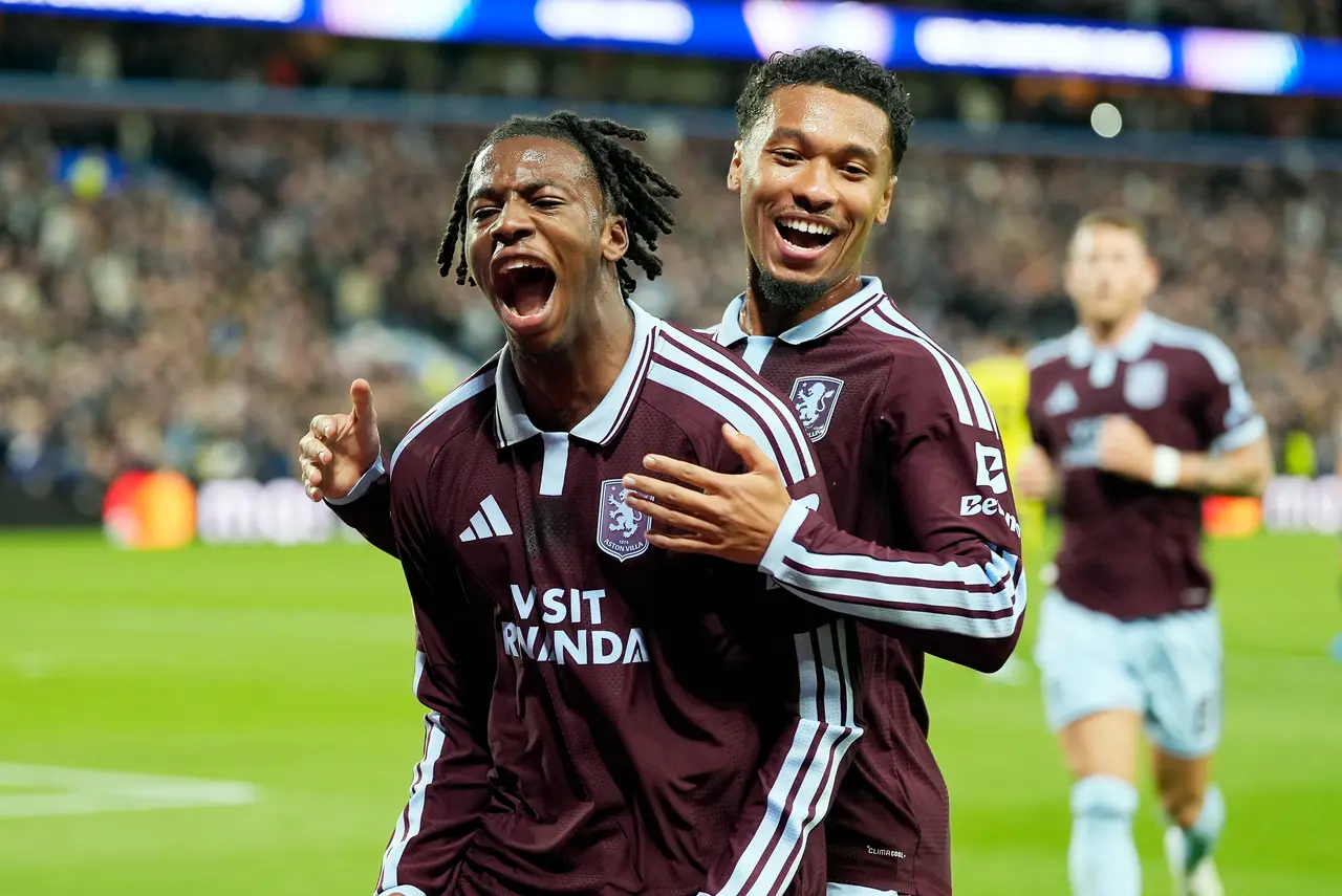  Johan Manzambi (L) of Aston Villa celebrates his goal during the UEFA Champions League soccer match between Aston Villa