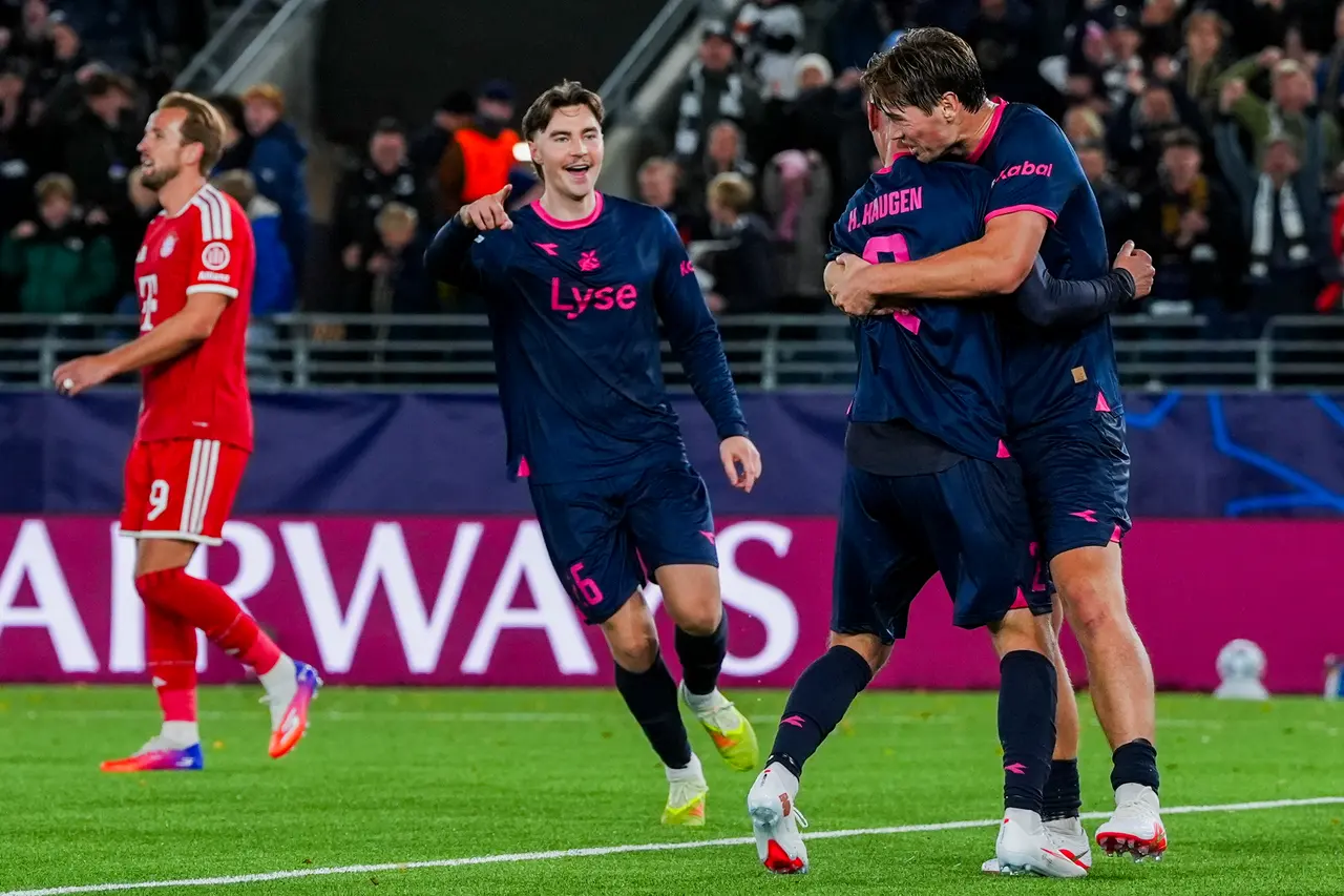 Viking's Herman Haugen (R) celebrates after the 3-3 goal during the UEFA Champions League football match between Viking and Bayern Munich
