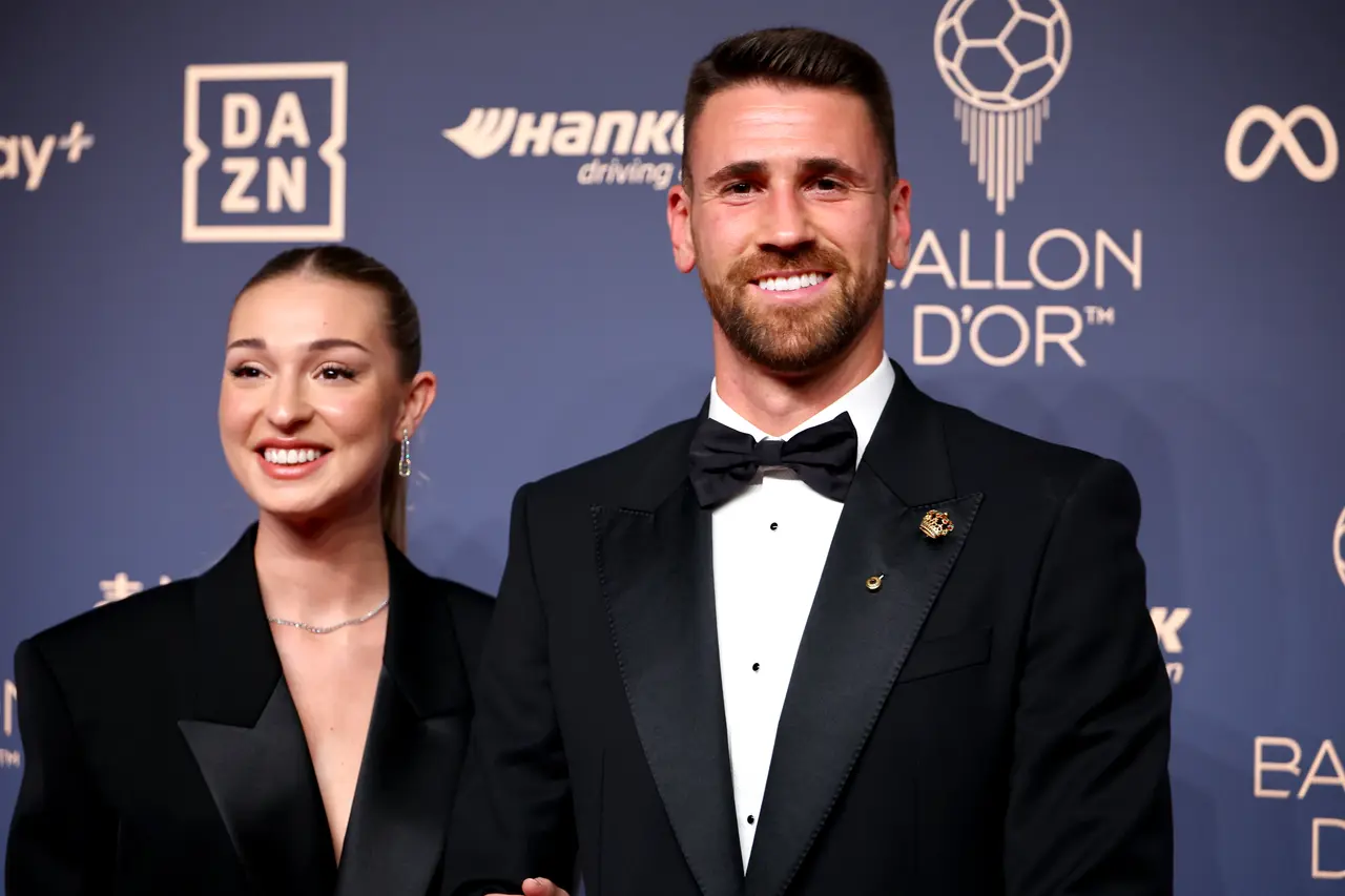 Spanish goalkeeper Unai Simon and guest arrive for the 2026 Ballon d'Or awards ceremony at the London Palladium Theatre
