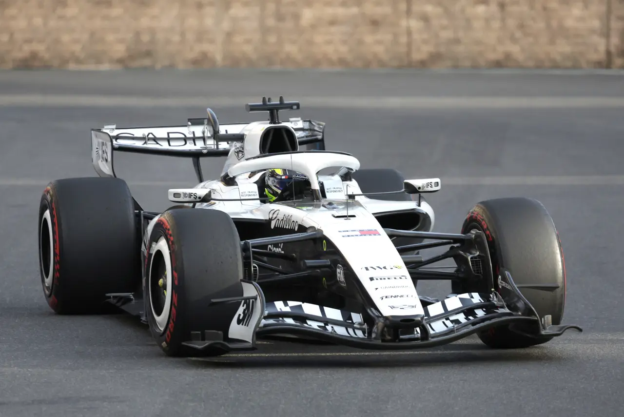 Cadillac driver Sergio Perez of Mexico steers his car during a practice session for the Formula One 