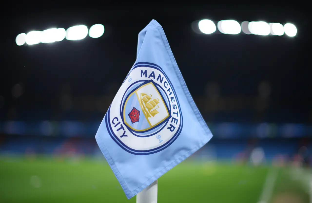 A corner flag in the Etihad Stadium with the Manchester City logo ahead of the English Premier League match