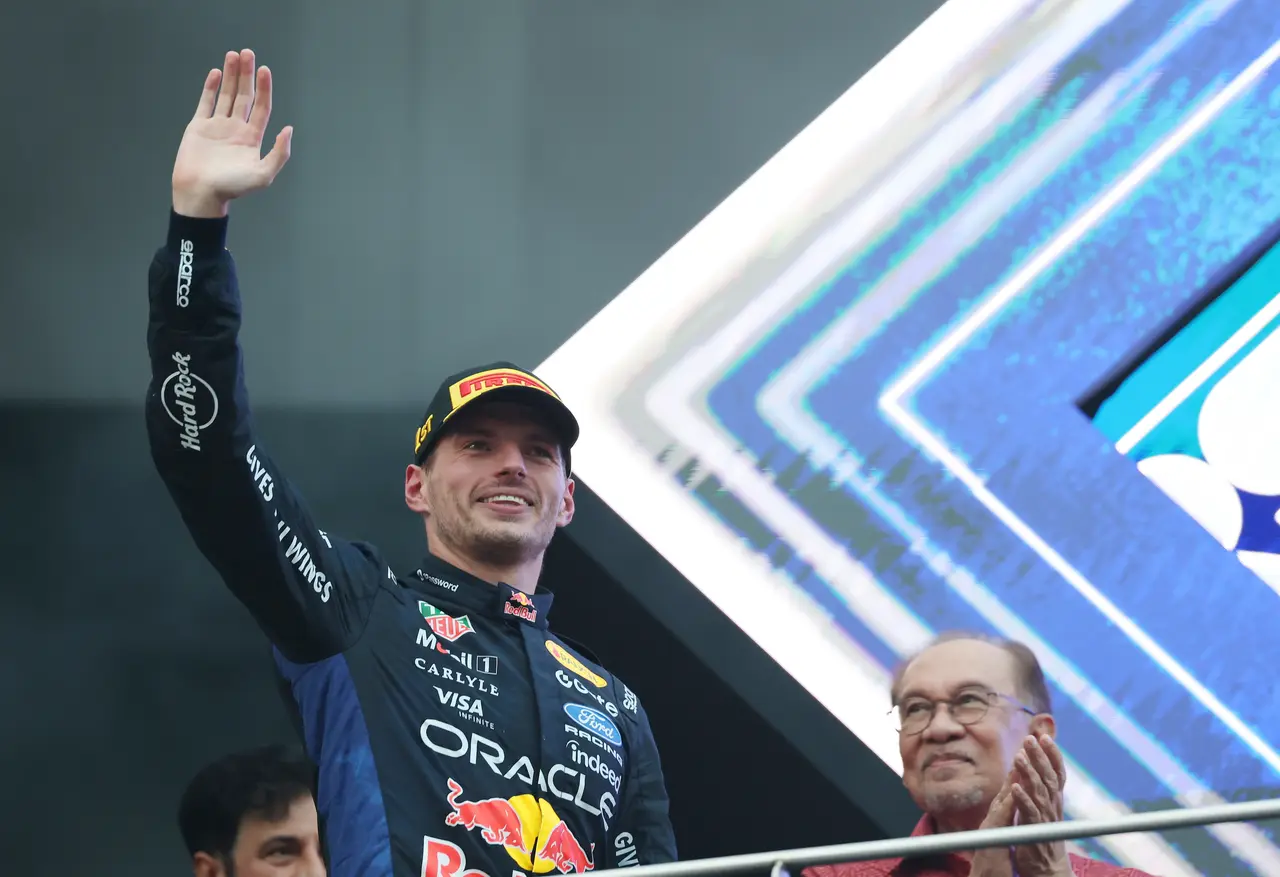 Red Bull Racing driver Max Verstappen of Netherlands celebrates on the podium after winning the Bahrain Grand Prix the Sepang International Circuit in Malaysia